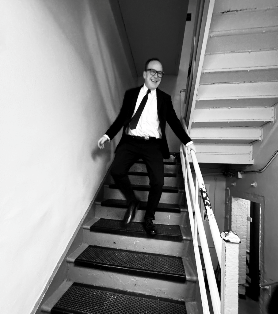 Mr. Glegg descends after his second Broadway Opening Night.